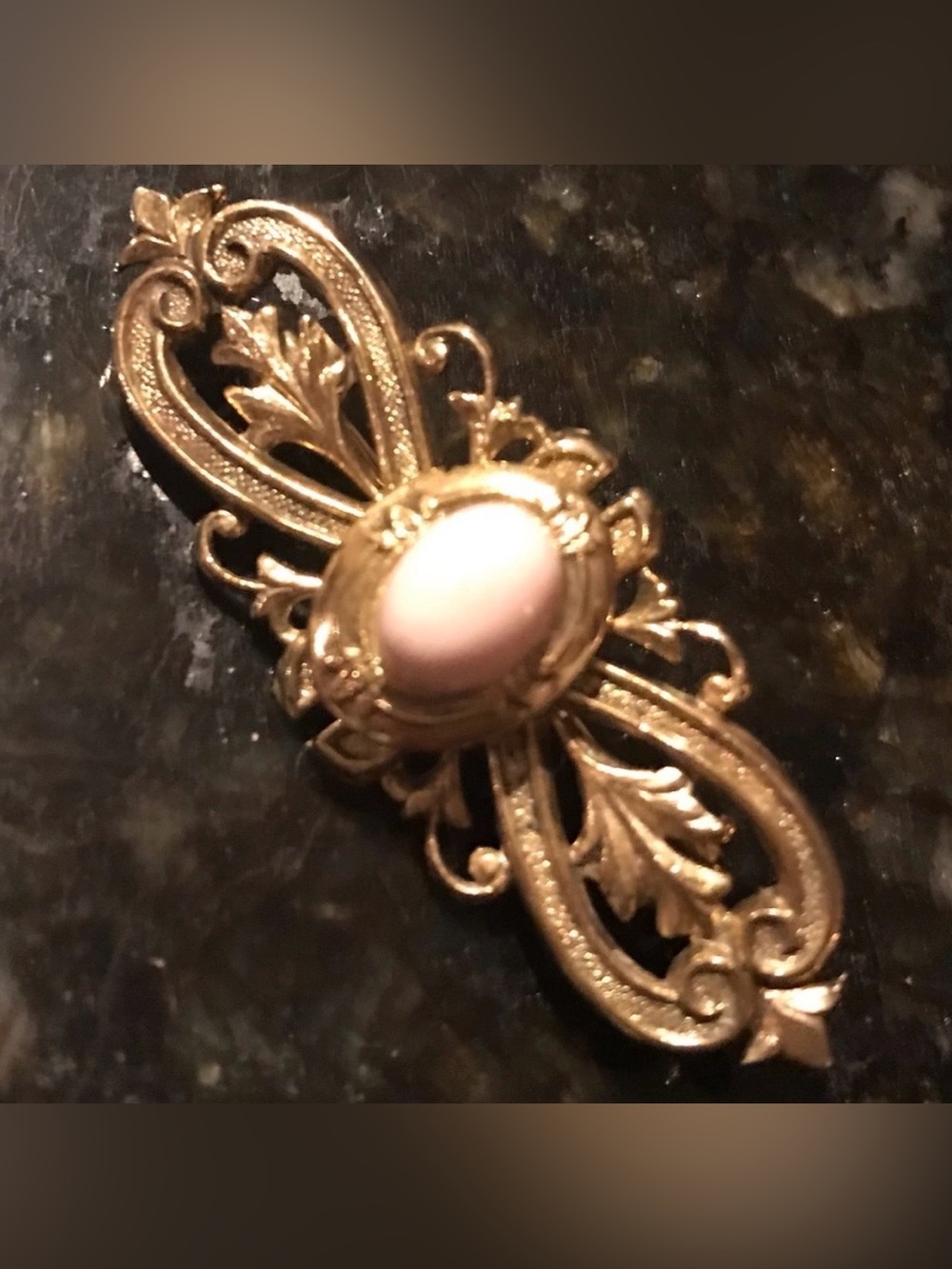 Vintage gold tone pink cabochon “stone” brooch